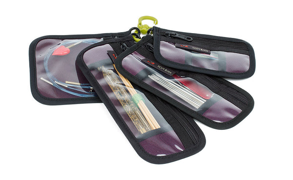 A Wasabi Medium Double Carabiner with all 4 sizes of Knitting Tool Pouch attached.